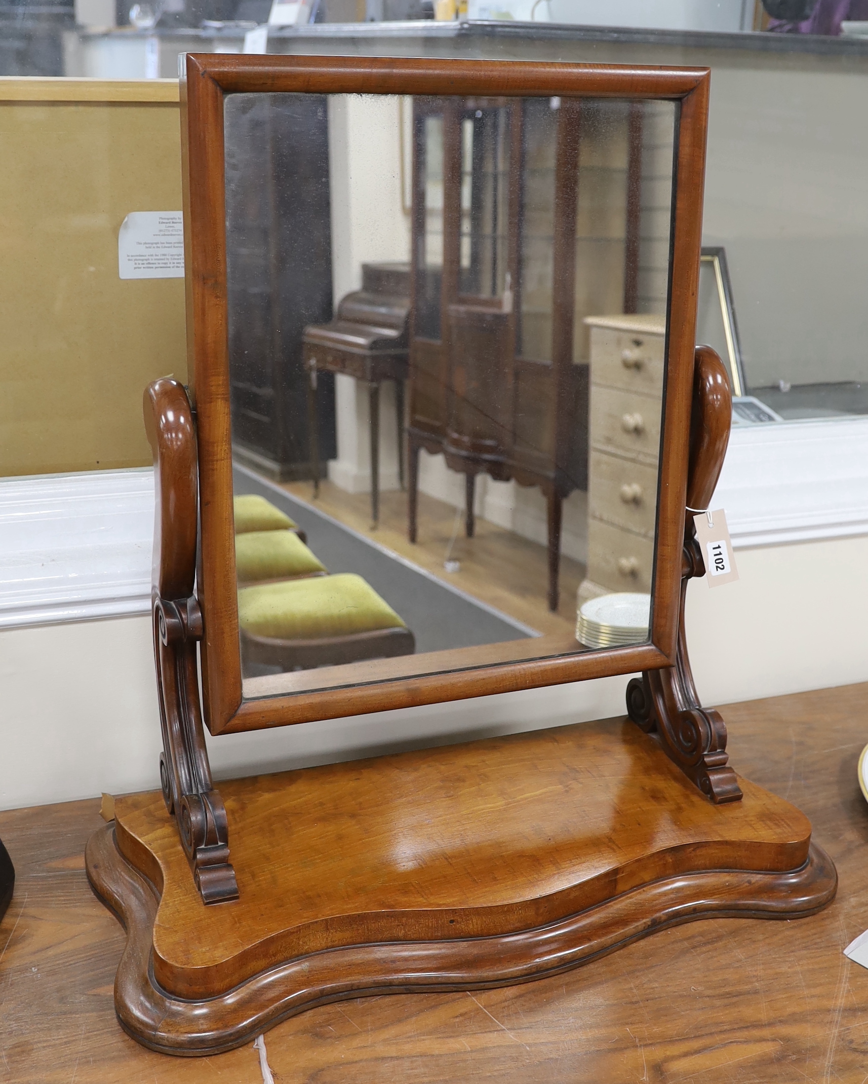 A Victorian mahogany serpentine front toilet mirror, width 66cm, depth 27cm, height 71cm